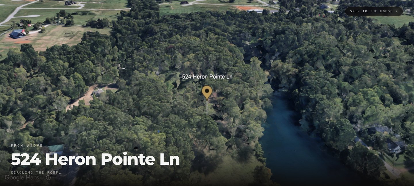 The sample single-property website for 524 Heron Pointe Ln circling the rooftop on a live satellite view of Cave Springs